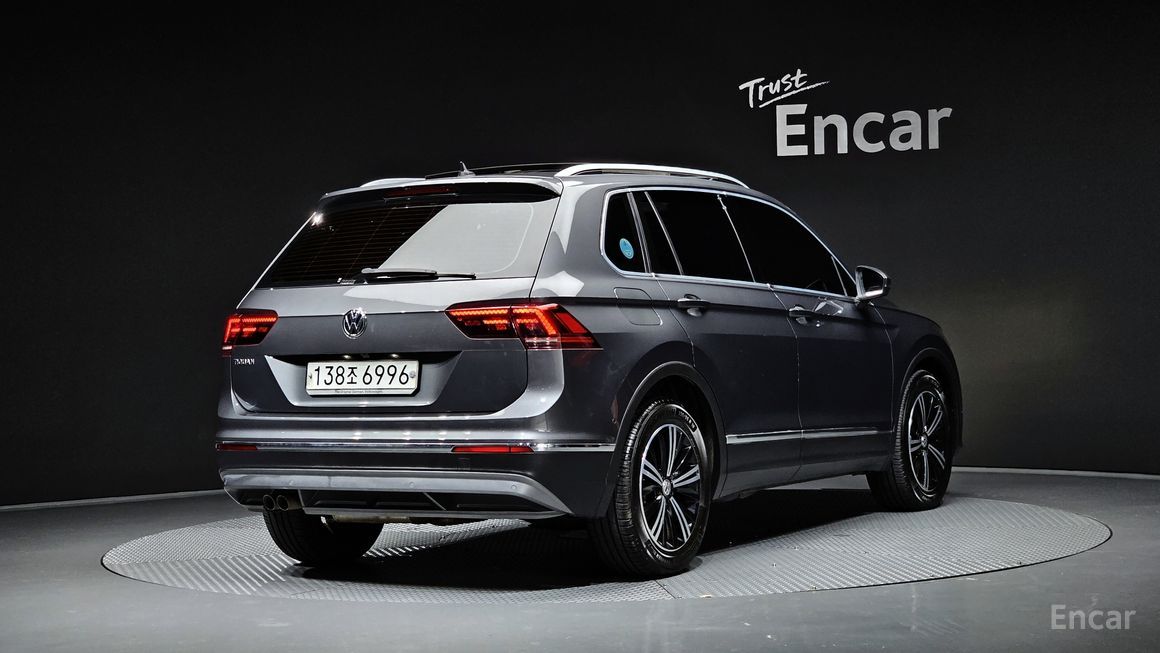 Volkswagen Tiguan - фото 1