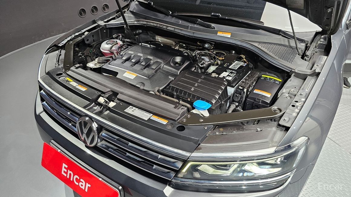 Volkswagen Tiguan - фото 5