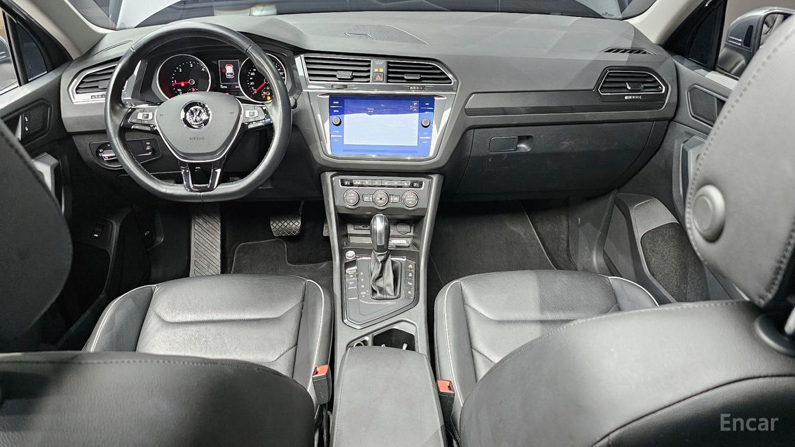 Volkswagen Tiguan - фото 6