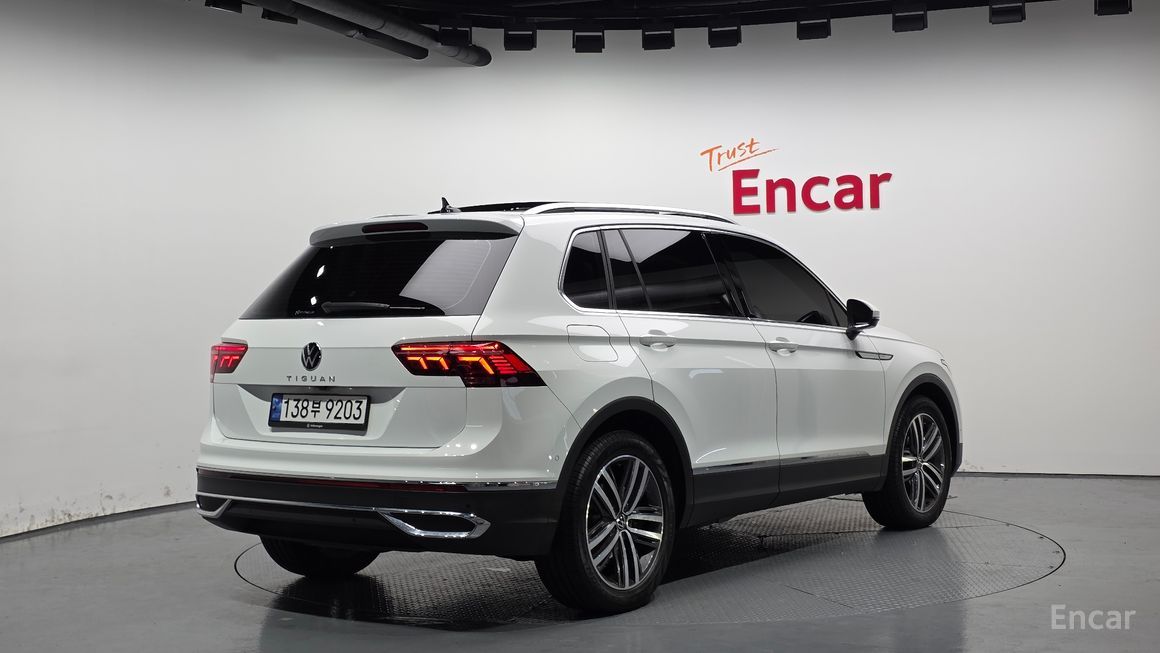 Volkswagen Tiguan - фото 1