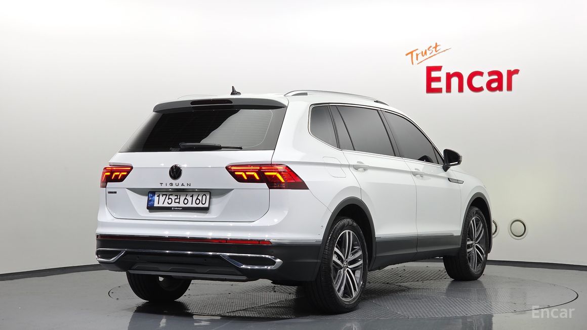 Volkswagen Tiguan - фото 1