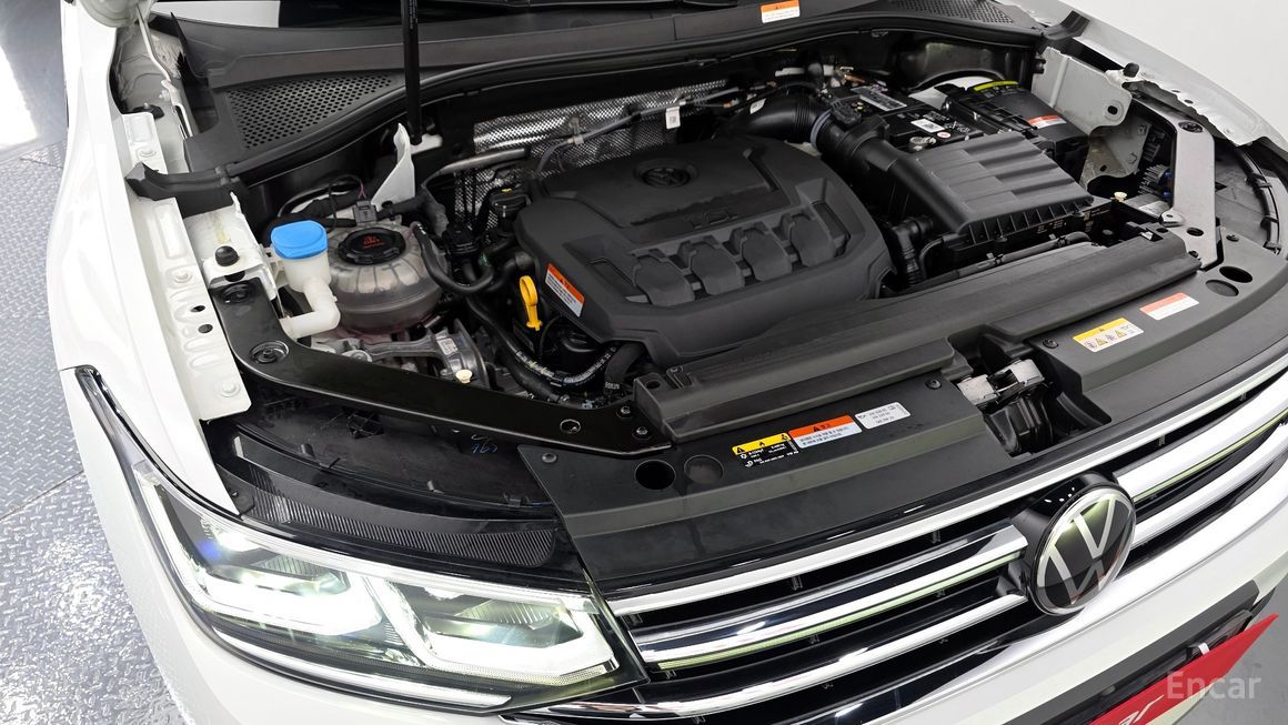 Volkswagen Tiguan - фото 5