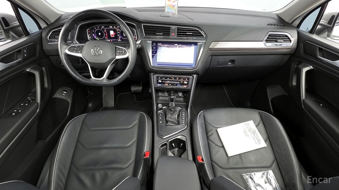 Volkswagen Tiguan - фото 6