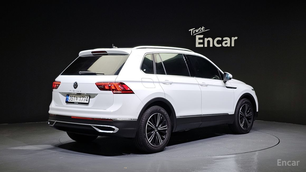 Volkswagen Tiguan - фото 1