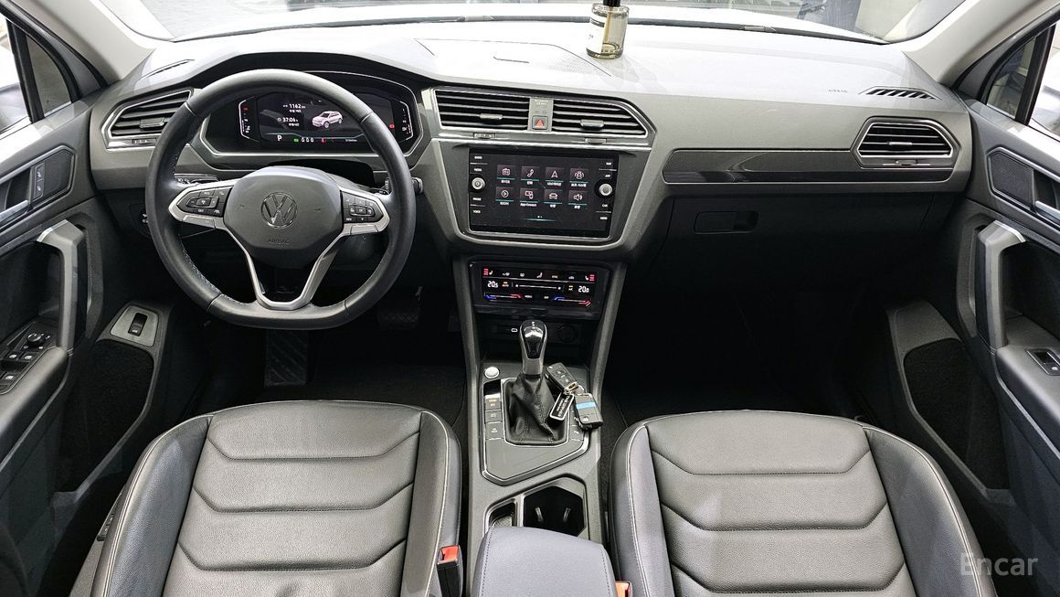 Volkswagen Tiguan - фото 6