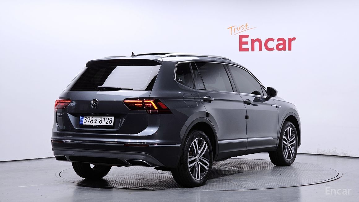 Volkswagen Tiguan - фото 1