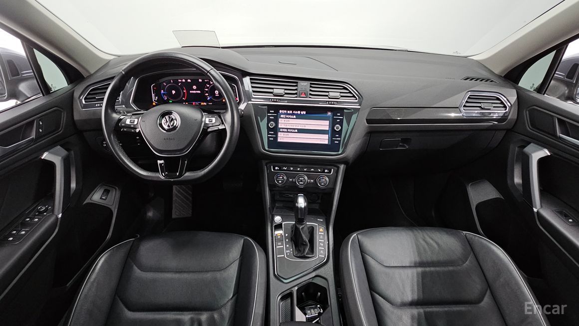 Volkswagen Tiguan - фото 6