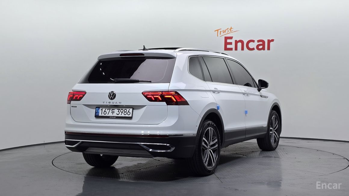 Volkswagen Tiguan - фото 1