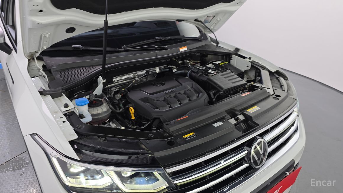 Volkswagen Tiguan - фото 5