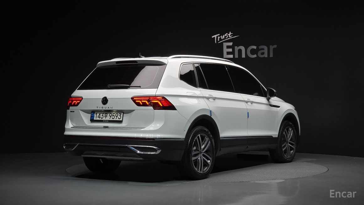 Volkswagen Tiguan - фото 1