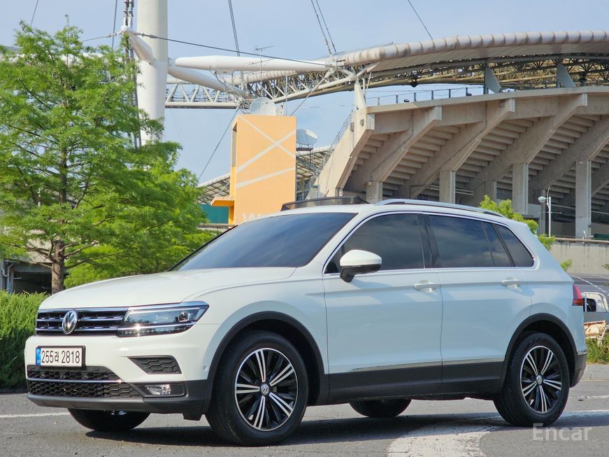 Volkswagen Tiguan - фото 1