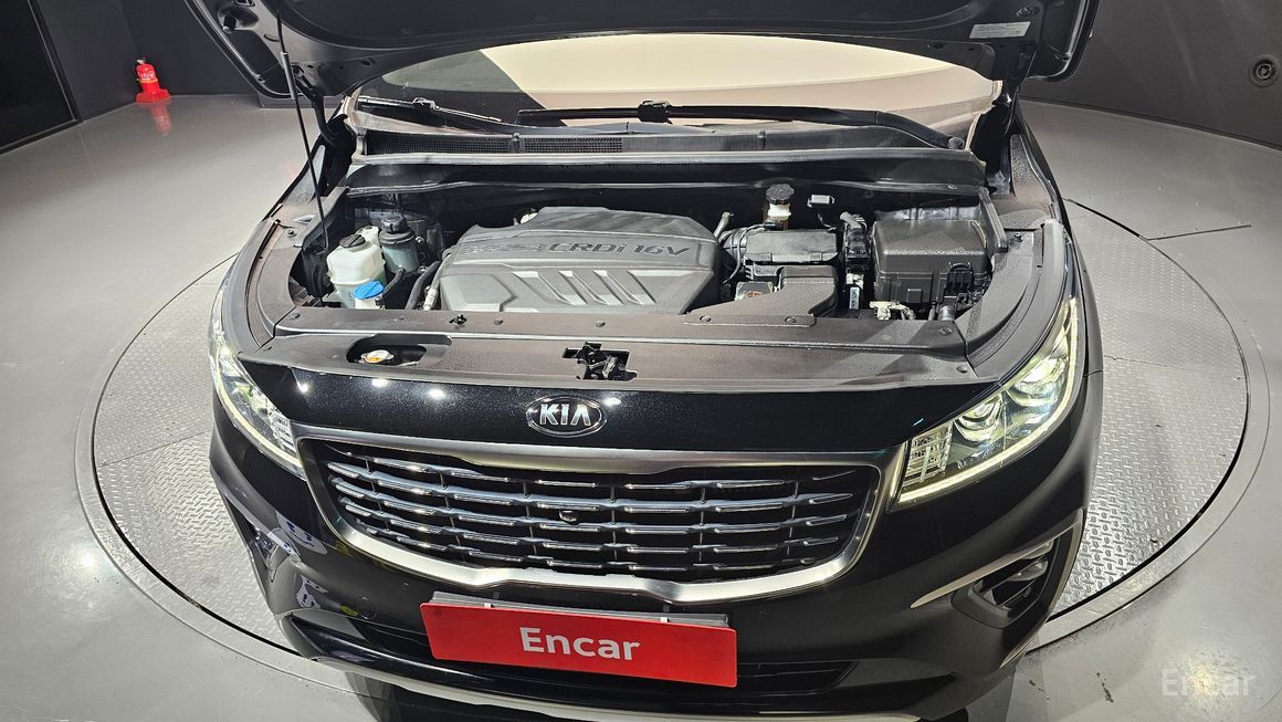 Kia Carnival - фото 5
