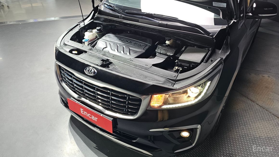 Kia Carnival - фото 5