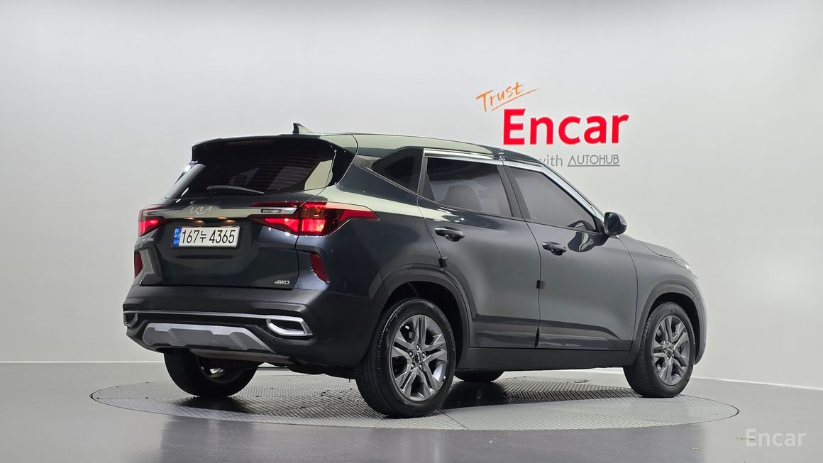 Kia Seltos - фото 1