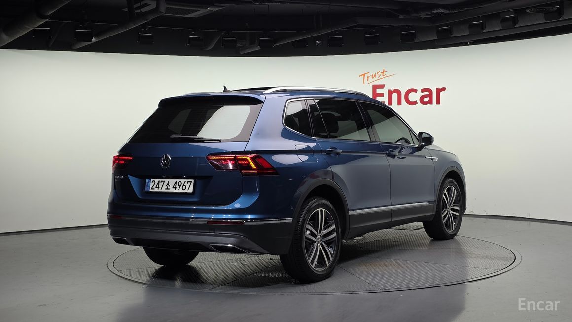 Volkswagen Tiguan - фото 1