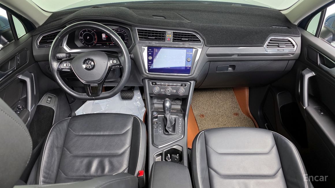 Volkswagen Tiguan - фото 6