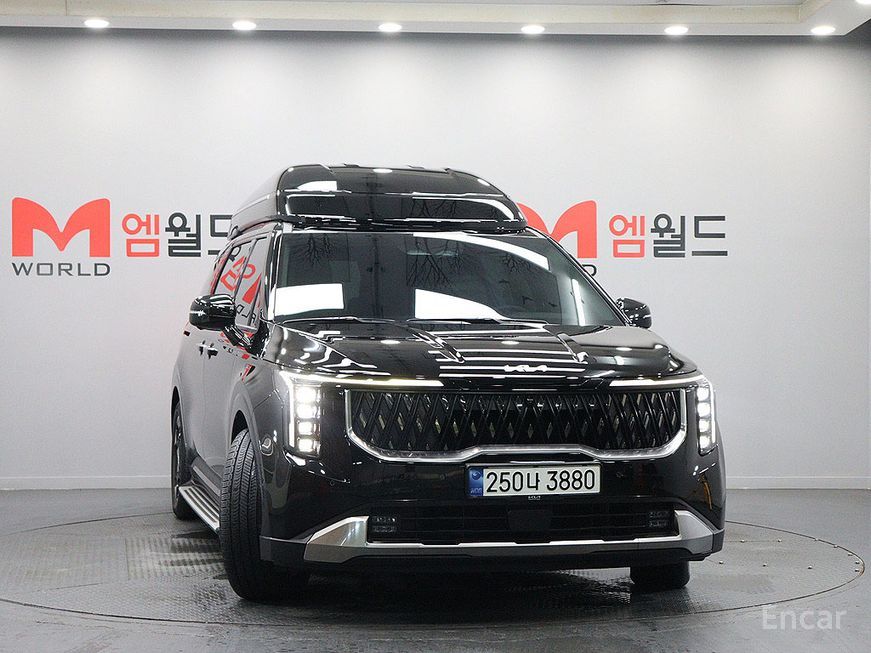 Kia Carnival - фото 1