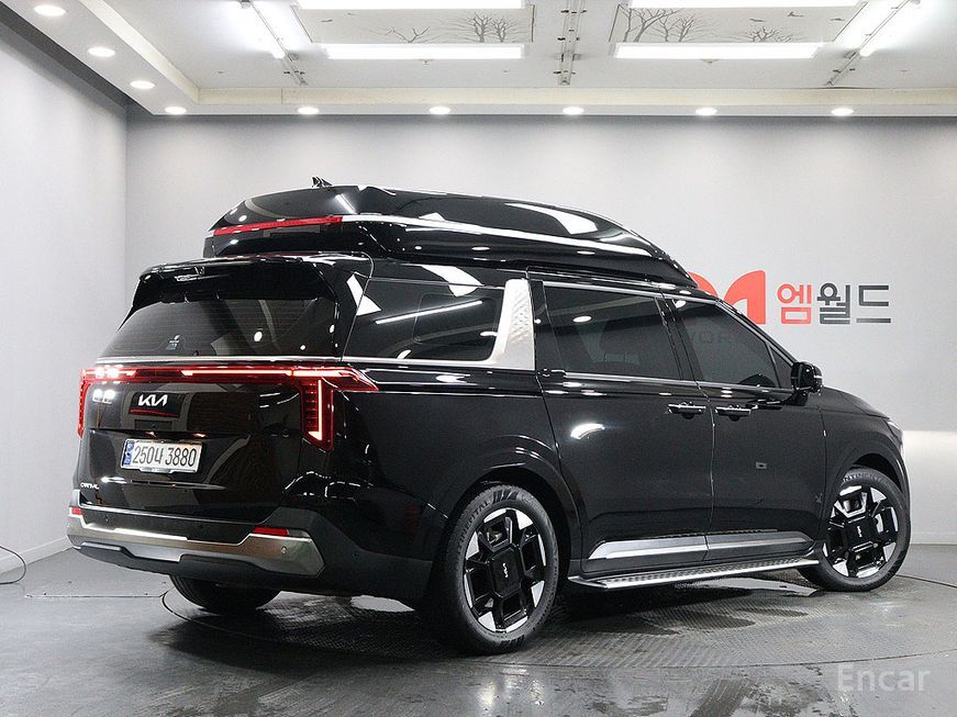 Kia Carnival - фото 2