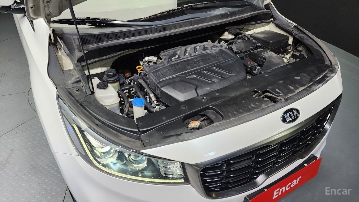 Kia Carnival - фото 5