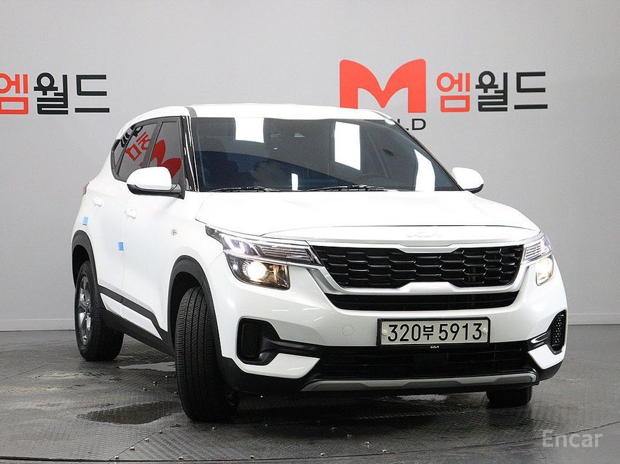 Kia Seltos - фото 1