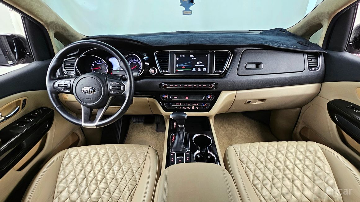 Kia Carnival - фото 6