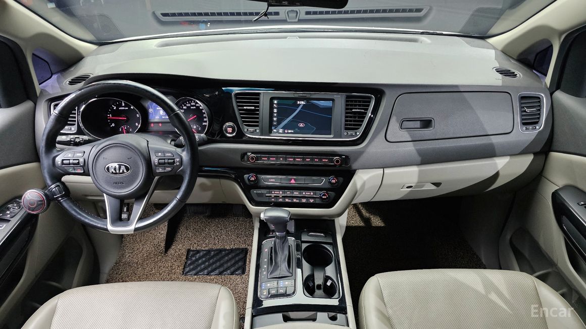 Kia Carnival - фото 6