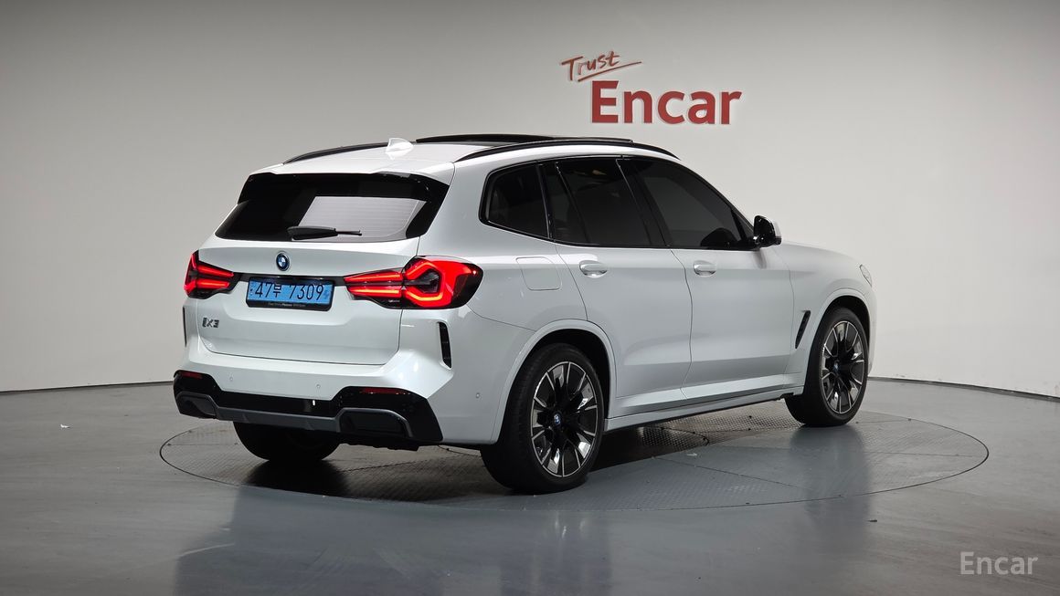 BMW iX3 - фото 1